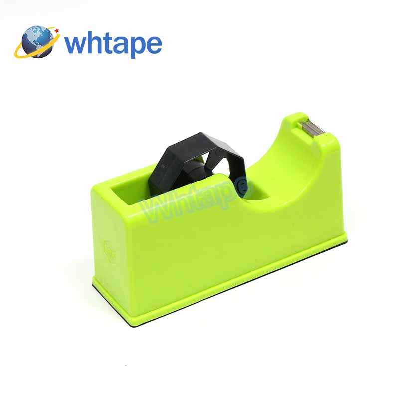 green stationery-tape-dispenser